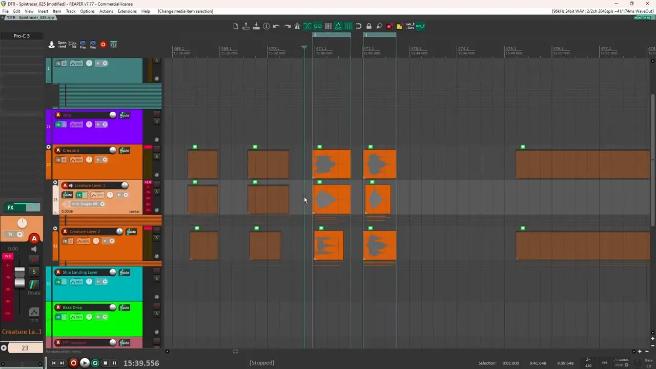 Reaper session with multiple orange audio clips arranged across several creature sound layers