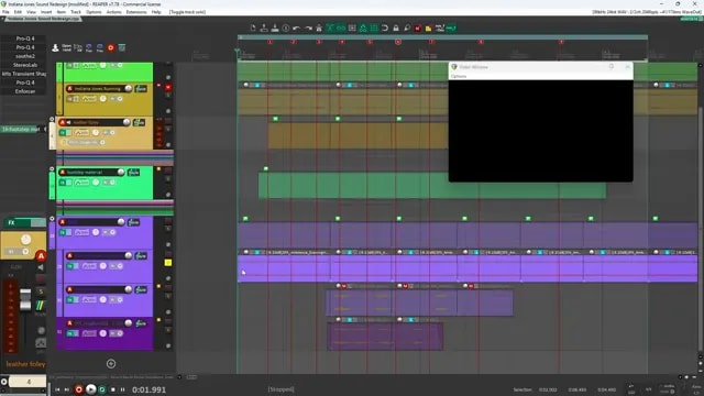 Reaper project showing coloured audio layers and game footage